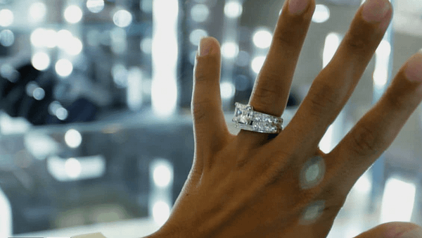 diamond ring on woman's hand